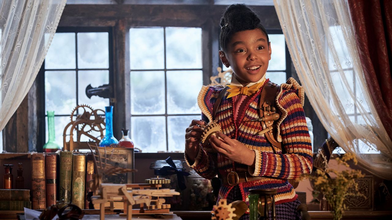 This image released by Netflix shows Madalen Mills as Journey Jangle in a scene from the holiday special 