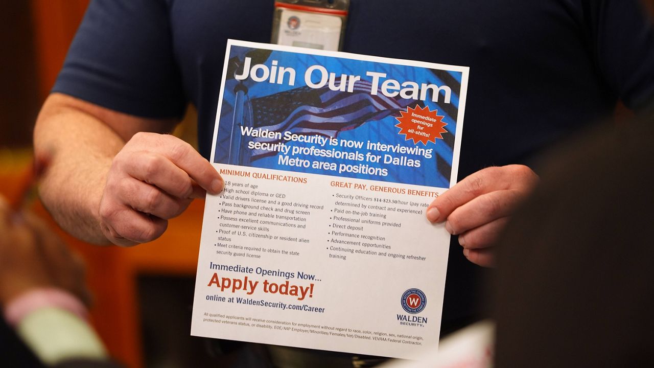 U.S. applications for jobless aid fell to 206,000 last week as layoffs remain low