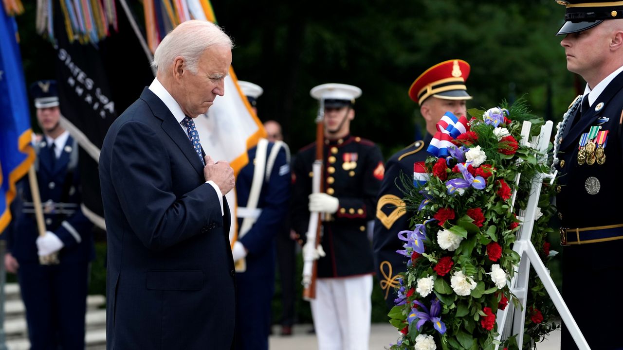 President Joe Biden pauses after laying a wreath at The Tomb of the Unknown Soldier Monday, May 29, 2023, at Arlington National Cemetery in Arlington, Va. (AP Photo/Susan Walsh)