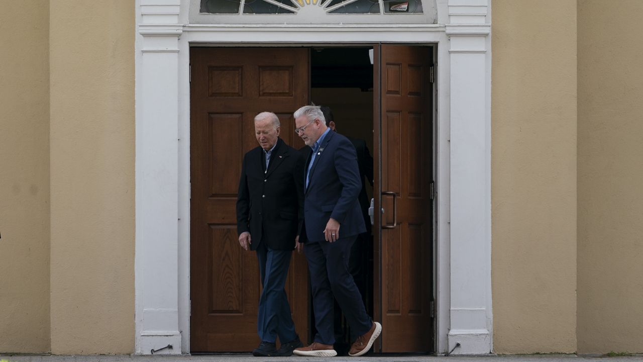 President Joe Biden, left, departs St. Joesph on the Brandywine Catholic Church in Wilmington, Del., Sunday, March 10, 2024, after attending Mass. (AP Photo/Stephanie Scarbrough)