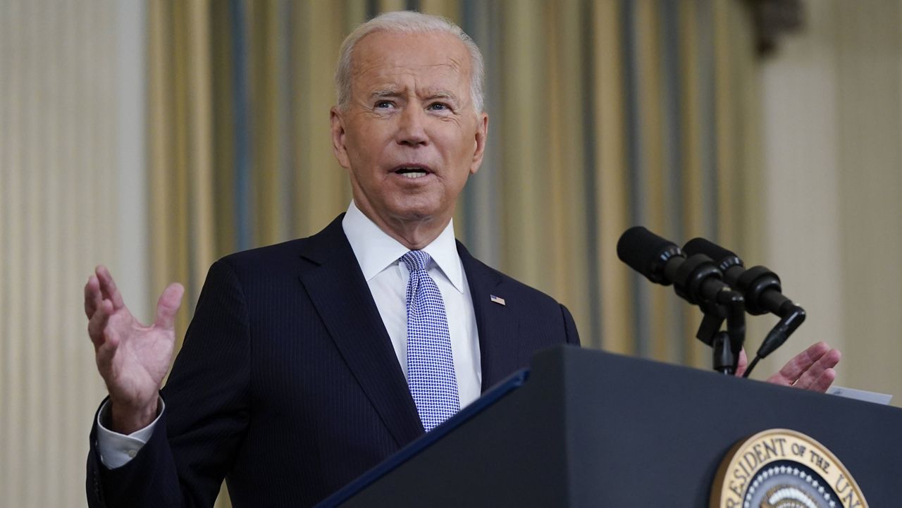 President Joe Biden speaks about the COVID-19 response and vaccinations in the State Dining Room of the White House on Friday. (AP Photo/Patrick Semansky)