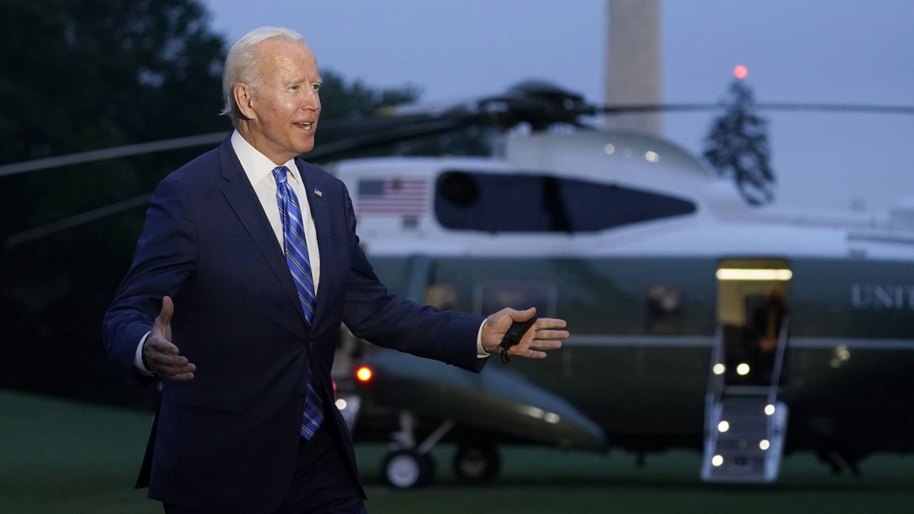 President Joe Biden talks with reporters after returning to the White House on Tuesday after a trip to Michigan to promote his infrastructure plan. (AP Photo/Susan Walsh)