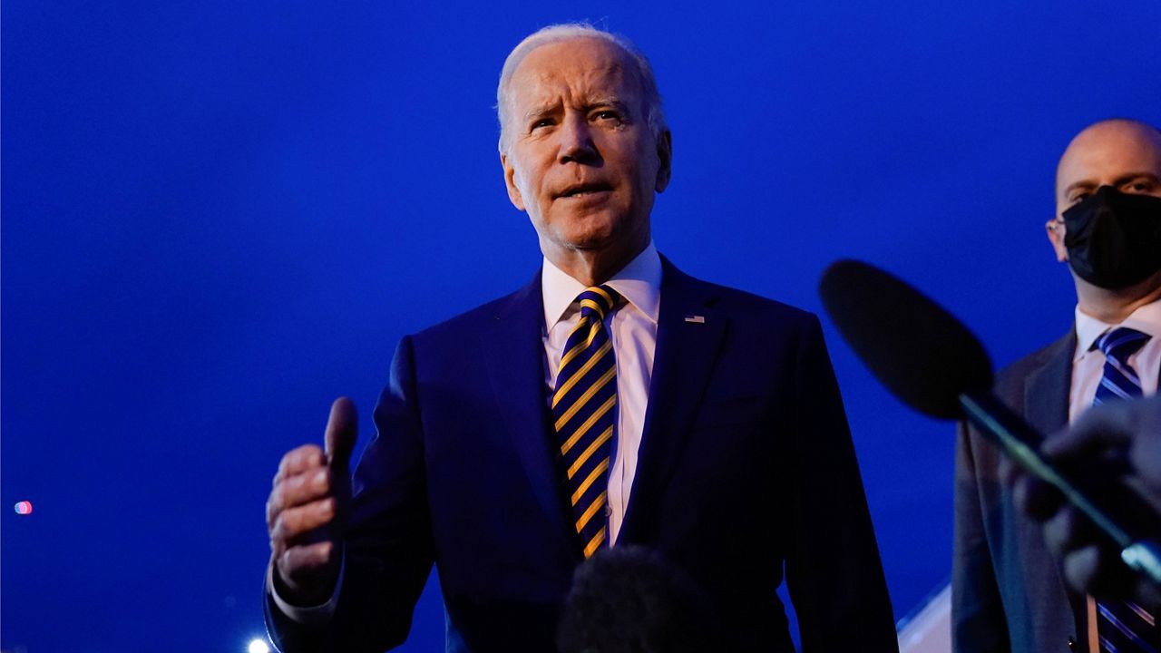 President Joe Biden speaks to members of the media before boarding Air Force One at Minneapolis-Saint Paul International Airport in Minneapolis on Tuesday. (AP Photo/Carolyn Kaster)