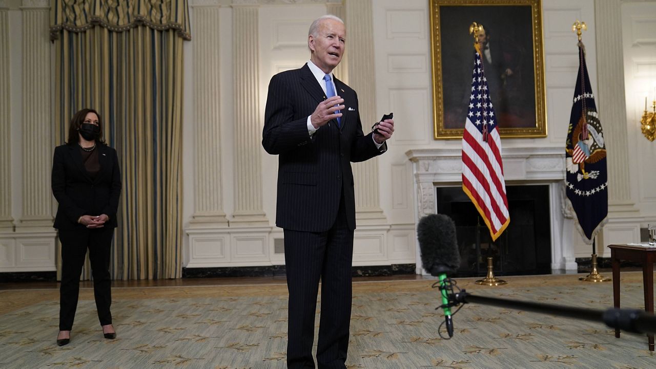 President Joe Biden speaks about efforts to combat COVID-19 in the State Dining Room of the White House on Tuesday. (AP Photo/Evan Vucci)