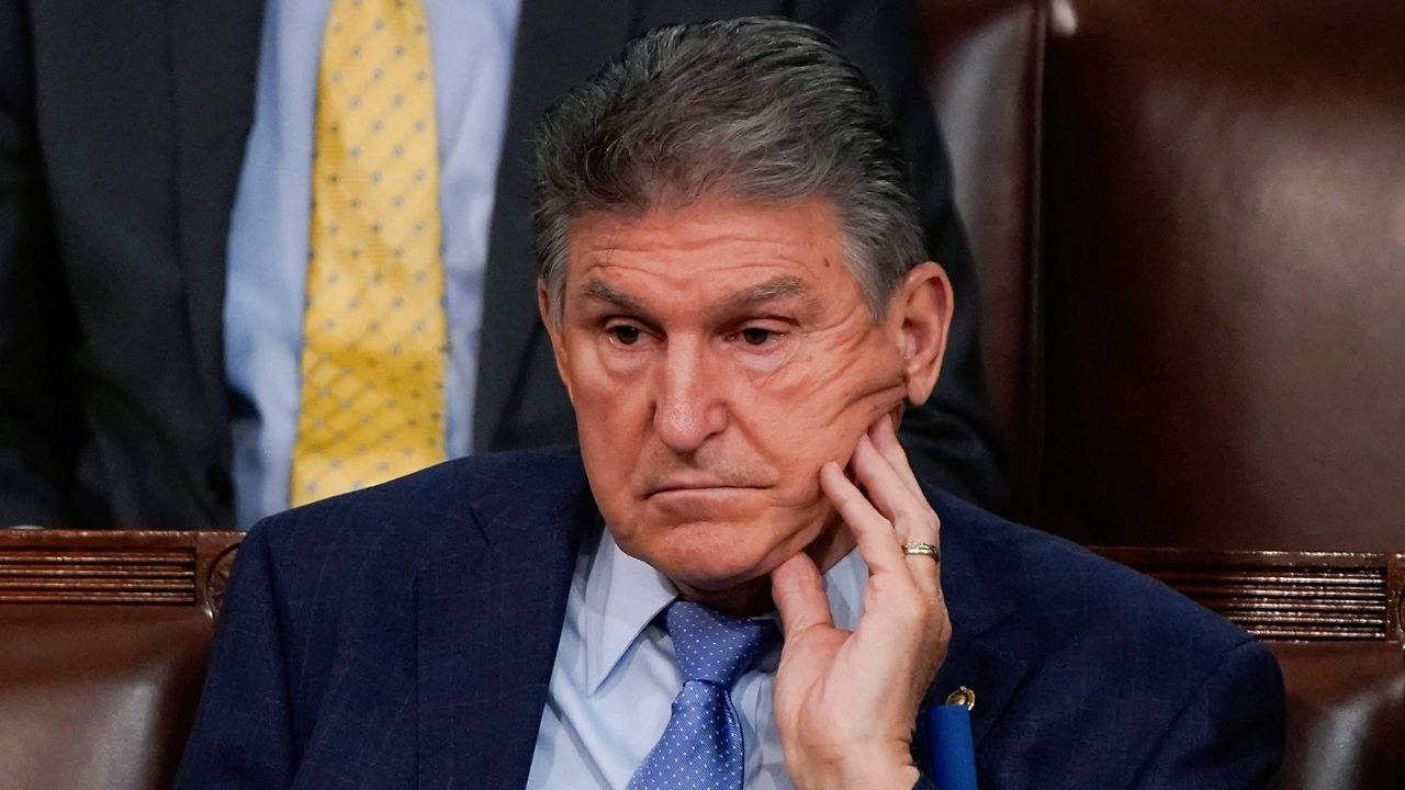 Sen. Joe Manchin, D-W.Va., listens Tuesday night as President Joe Biden delivers his State of the Union address at the Capitol. (AP Photo/J. Scott Applewhite, Pool)