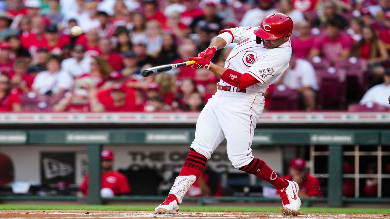 Cincinnati Reds' Joey Votto hits a two-run home run against the Baltimore Orioles during the first inning of a baseball game Friday, July 29, 2022, in Cincinnati. (AP Photo/Jeff Dean)