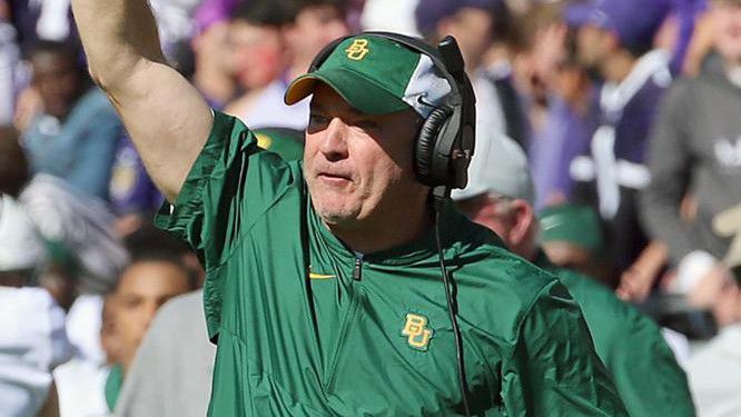 This undated photo shows Baylor associate head coach Joey McGuire during an NCAA college football game in Waco, Texas.  (Jerry Larson/Waco Tribune Herald, via AP)