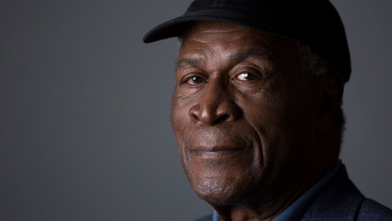 John Amos poses for a portrait on May 11, 2016, in New York. Amos, who starred as the family patriarch on the hit 1970s sitcom “Good Times” and earned an Emmy nomination for his role in the seminal 1977 miniseries “Roots,” has died. He was 84. (Photo by Amy Sussman/Invision/AP)