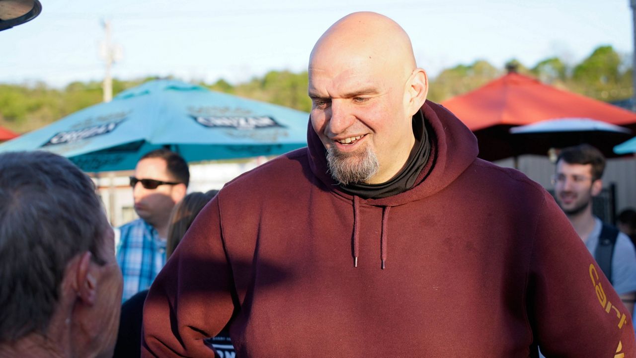 Pennsylvania Lt. Governor John Fetterman, who is running for the Democratic nomination for the U.S. Senate for Pennsylvania, greets supporters Tuesday at a campaign stop in Greensburg, Pa. (AP Photo/Keith Srakocic)