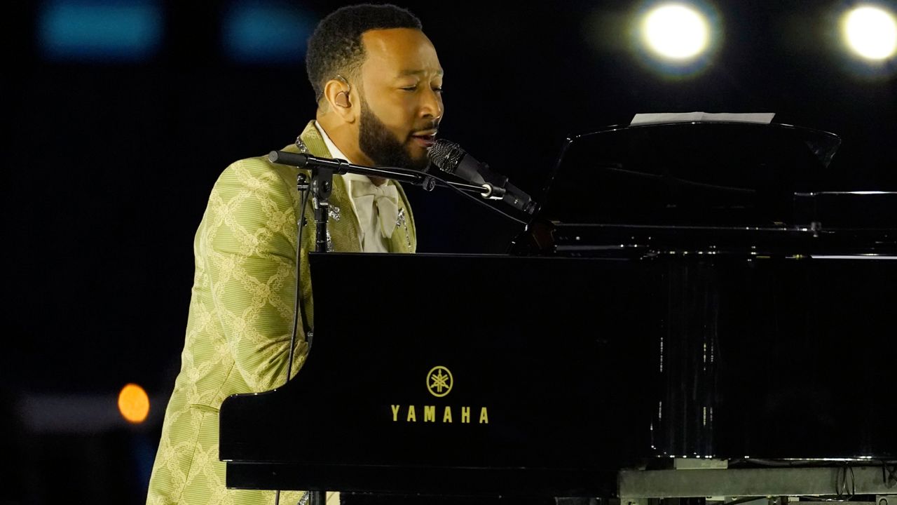 John Legend performs "River" at the 31st annual MusiCares Person of the Year benefit gala honoring Joni Mitchell on Friday, April 1, 2022, at the MGM Grand Conference Center in Las Vegas. (AP Photo/Chris Pizzello)