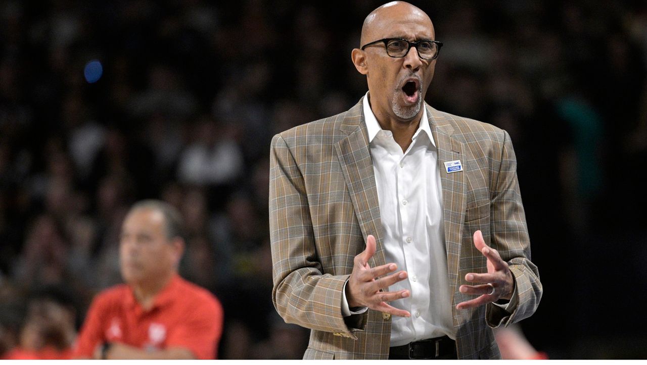 Johnny Dawkins has signed a contract extension to stay on the University of Central Florida's sideline through the 2026-27 season. (AP Photo/Phelan M. Ebenhack)