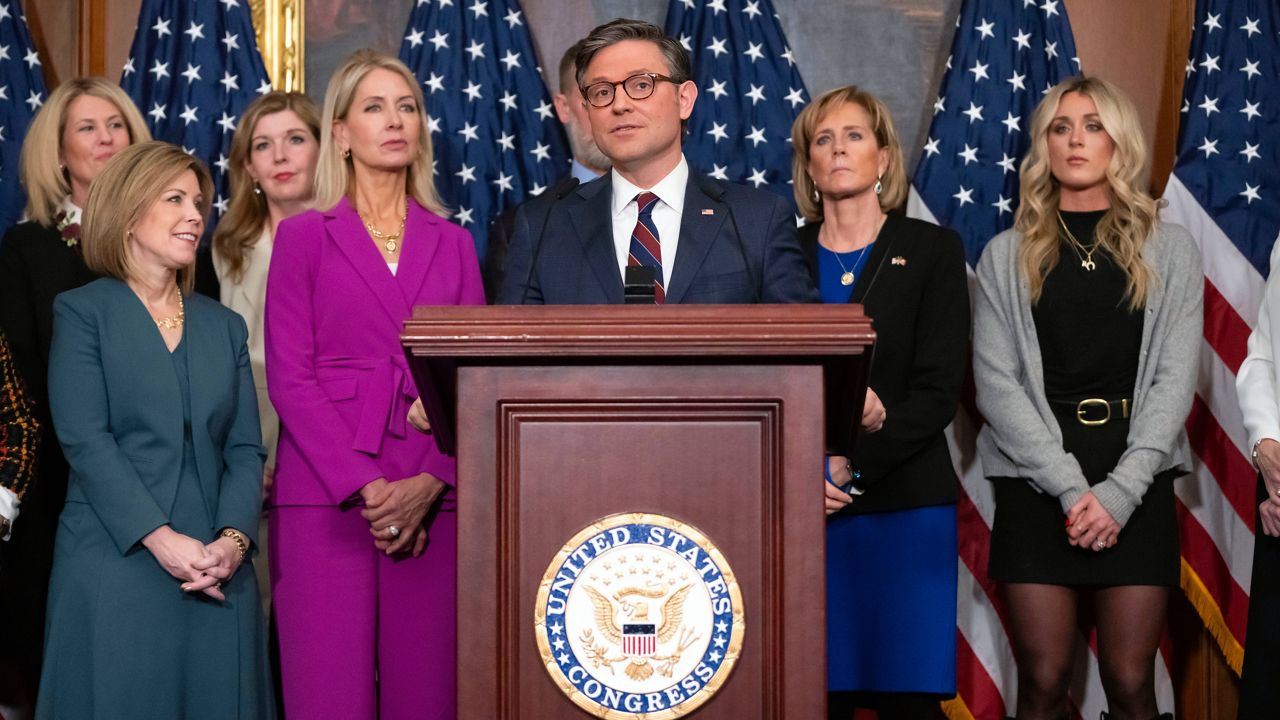 House Speaker Mike Johnson, R-La., center, speaks during a news conference after the House passed a measure that would ban transgender women and girls from sports programs receiving federal funding, Tuesday, Jan. 14, 2025, in Washington. (AP Photo/Mark Schiefelbein)