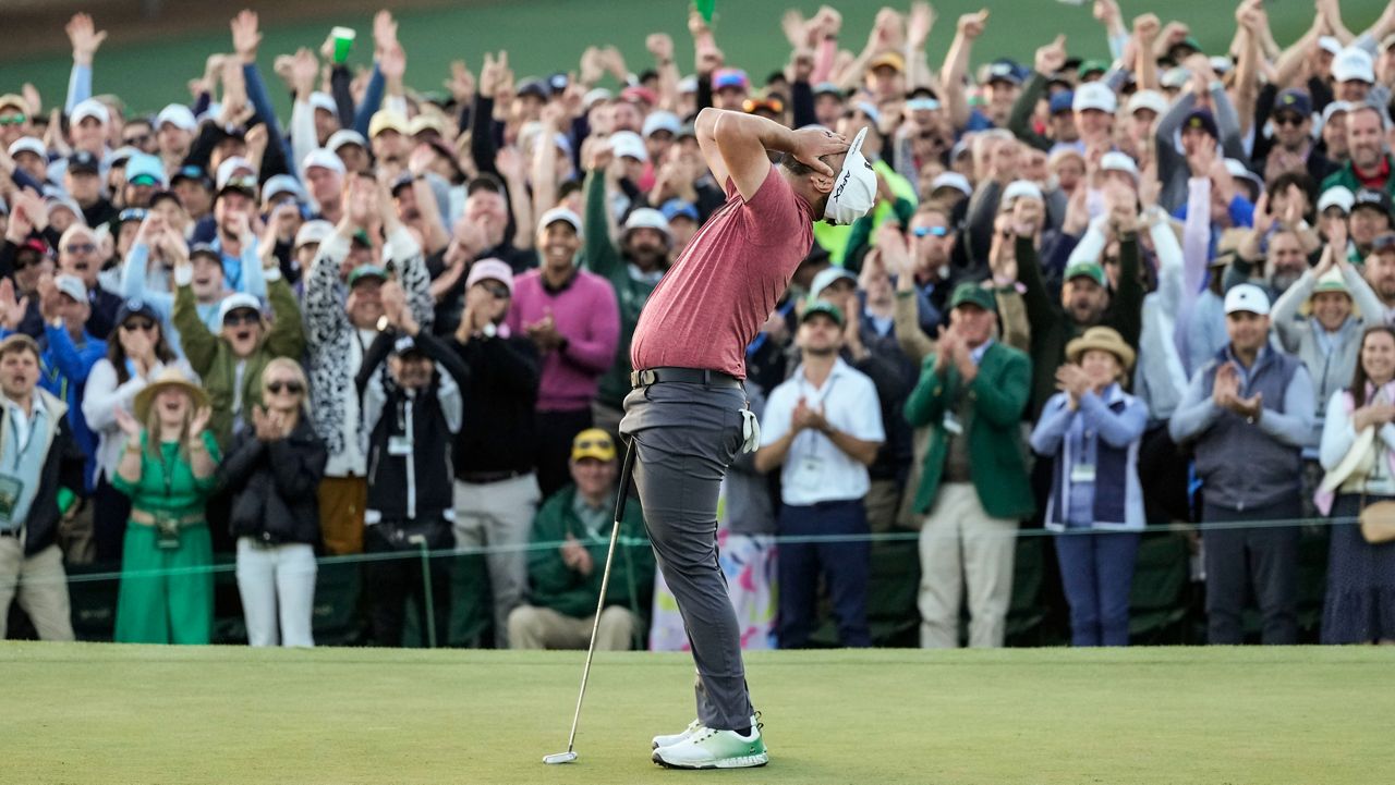 Jon Rahm, of Spain, celebrates on the 18th green after winning the Masters golf tournament at Augusta National Golf Club on Sunday, April 9, 2023, in Augusta, Ga. (AP Photo/Jae C. Hong)