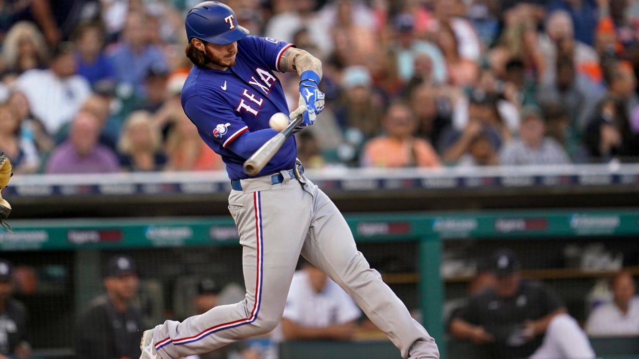 Texas Rangers catcher Jonah Heim reacts after striking out during an MLB  regular season game against the Colorado Rockies, Tuesday, June 1, 2021, in  D Stock Photo - Alamy