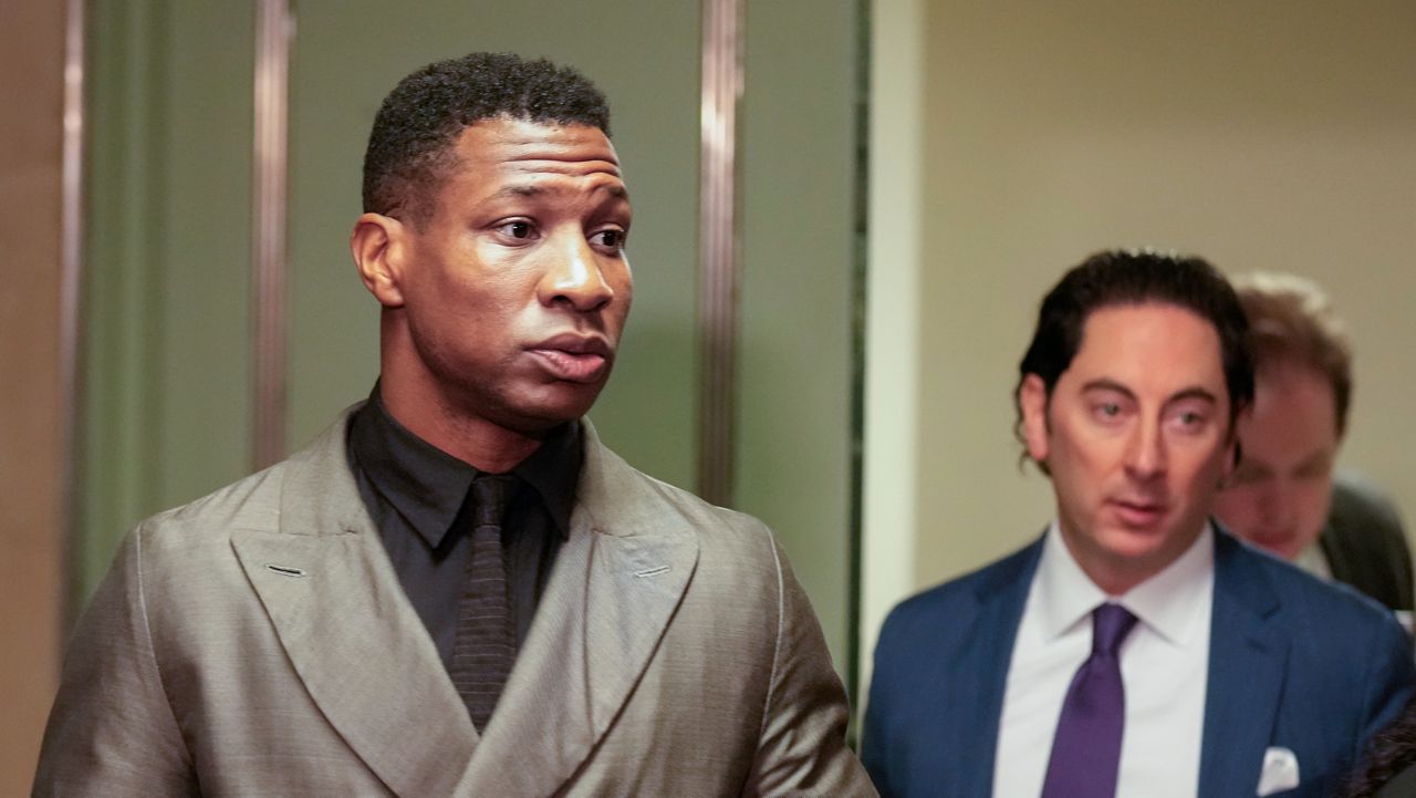 Jonathan Majors enters a courtroom at the Manhattan criminal courts in New York on Dec. 18, 2023.