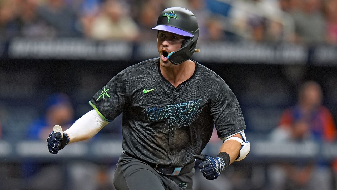 Tampa Bay Rays' Jonny DeLuca celebrates his game-winning hit off New York Mets relief pitcher Jake Diekman during the 10th inning of a baseball game Sunday, May 5, 2024, in St. Petersburg, Fla. (AP Photo/Chris O'Meara)