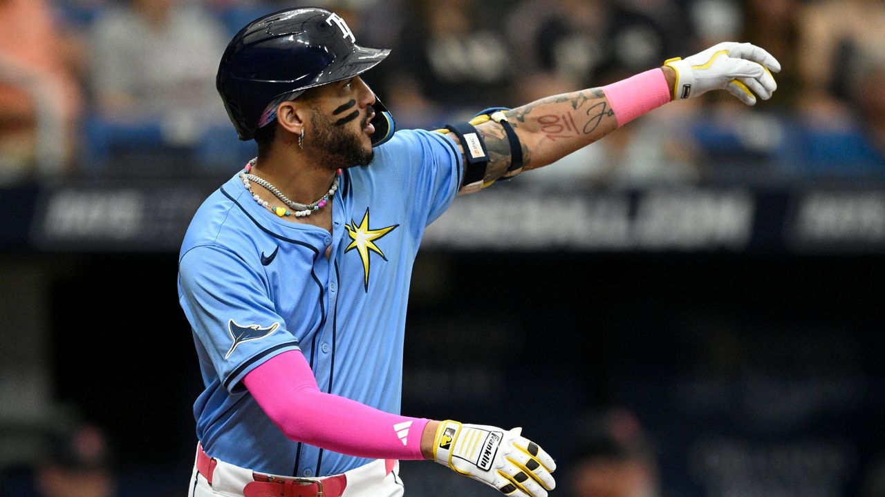 Tampa Bay Rays' Jose Siri watches the flight of the ball after hitting a solo home run during the third inning of a baseball game against the Cleveland Guardians, Sunday, July 14, 2024, in St. Petersburg, Fla. (AP Photo/Phelan M. Ebenhack)