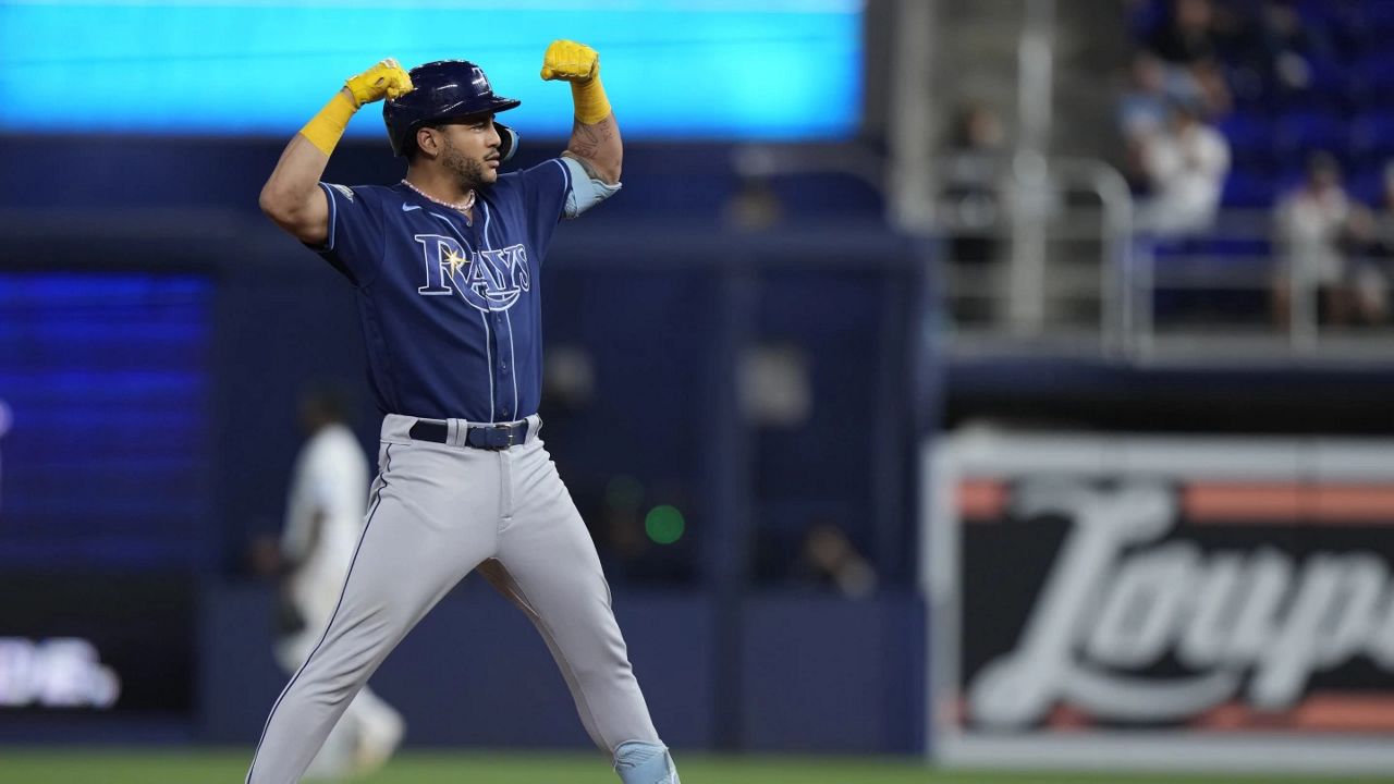 Red-hot Rays ride three homers to rout Marlins, 11-2