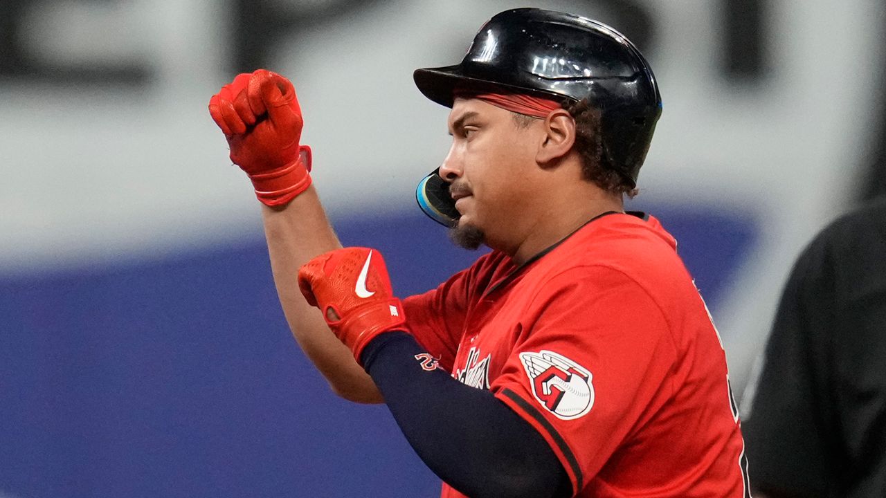 Cleveland Guardians' Josh Naylor gestures from second base after hitting a double in the eighth inning of a baseball game against the Minnesota Twins, Monday, Sept. 16, 2024, in Cleveland. (AP Photo/Sue Ogrocki)