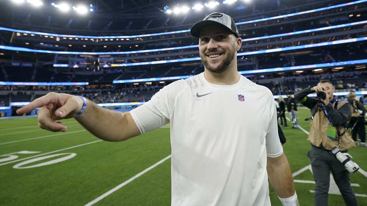 Buffalo Bills quarterback Josh Allen walks off the field after a win over the Los Angeles Chargers in an NFL football game Saturday, Dec. 23, 2023, in Inglewood, Calif. (AP Photo/Ryan Sun)