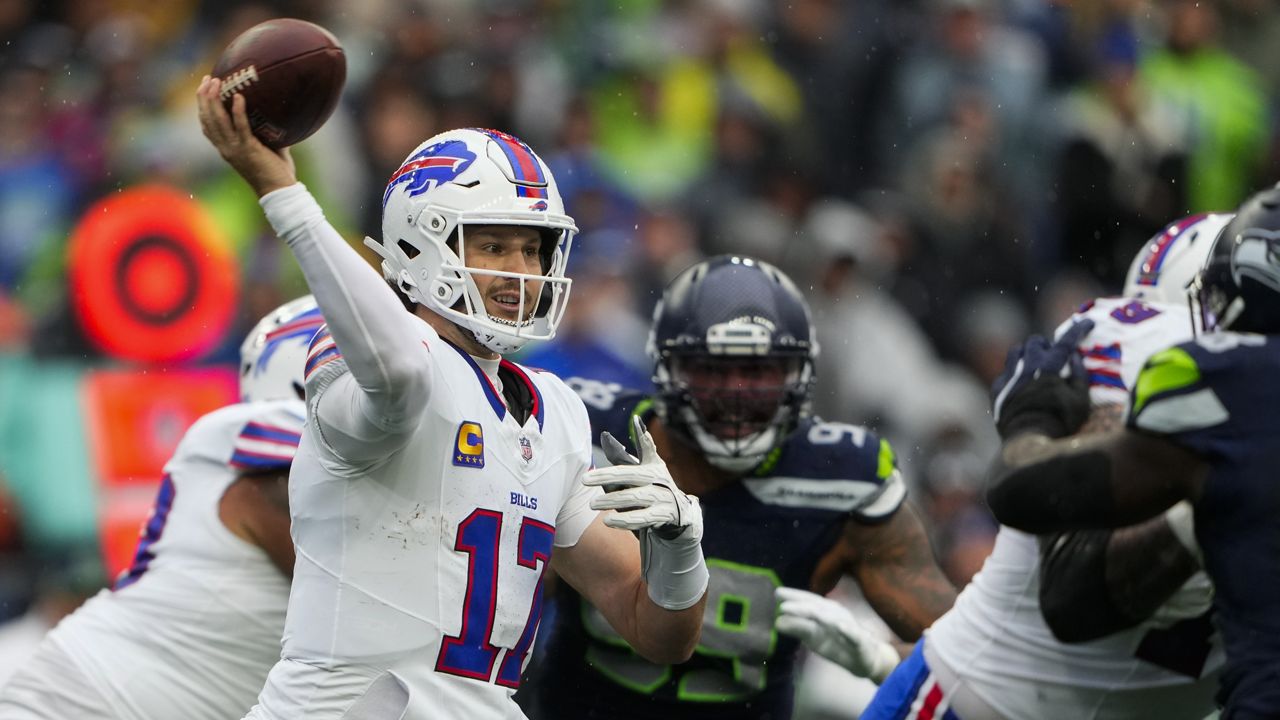 Buffalo Bills quarterback Josh Allen (17) throws during the first half of an NFL football game against the Seattle Seahawks, Sunday, Oct. 27, 2024, in Seattle. (AP Photo/Lindsey Wasson