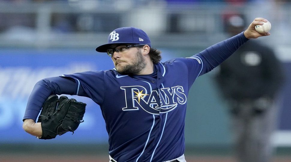 Tampa Bay Rays starting pitcher Josh Fleming throws during the first inning of a baseball game against the Kansas City Royals, Monday, April 19, 2021, in Kansas City, Mo. (AP Photo/Charlie Riedel)