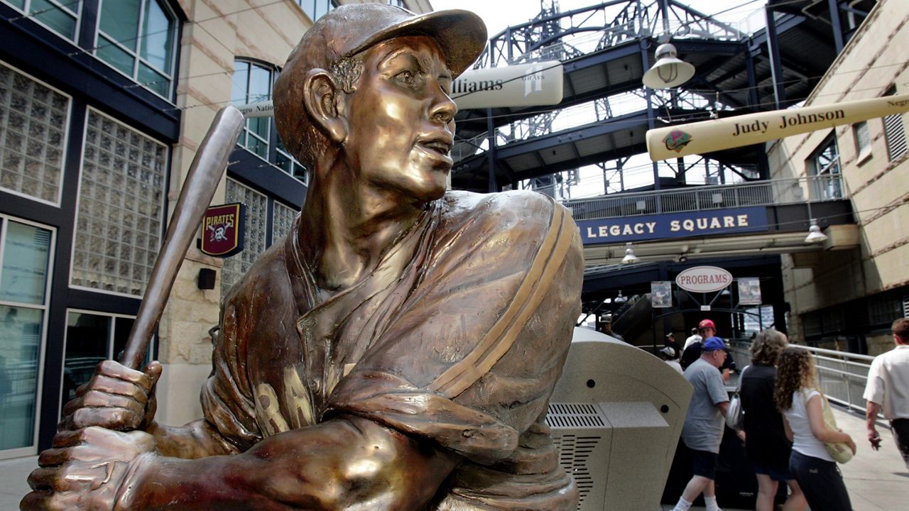 This June 29, 2006, file photo, shows a bronze statue of Pittsburgh native Josh Gibson in Legacy Square when it was unveiled at PNC Park, the home of Major League Baseball's Pittsburgh Pirates. (AP Photo/Gene J. Puskar, File)