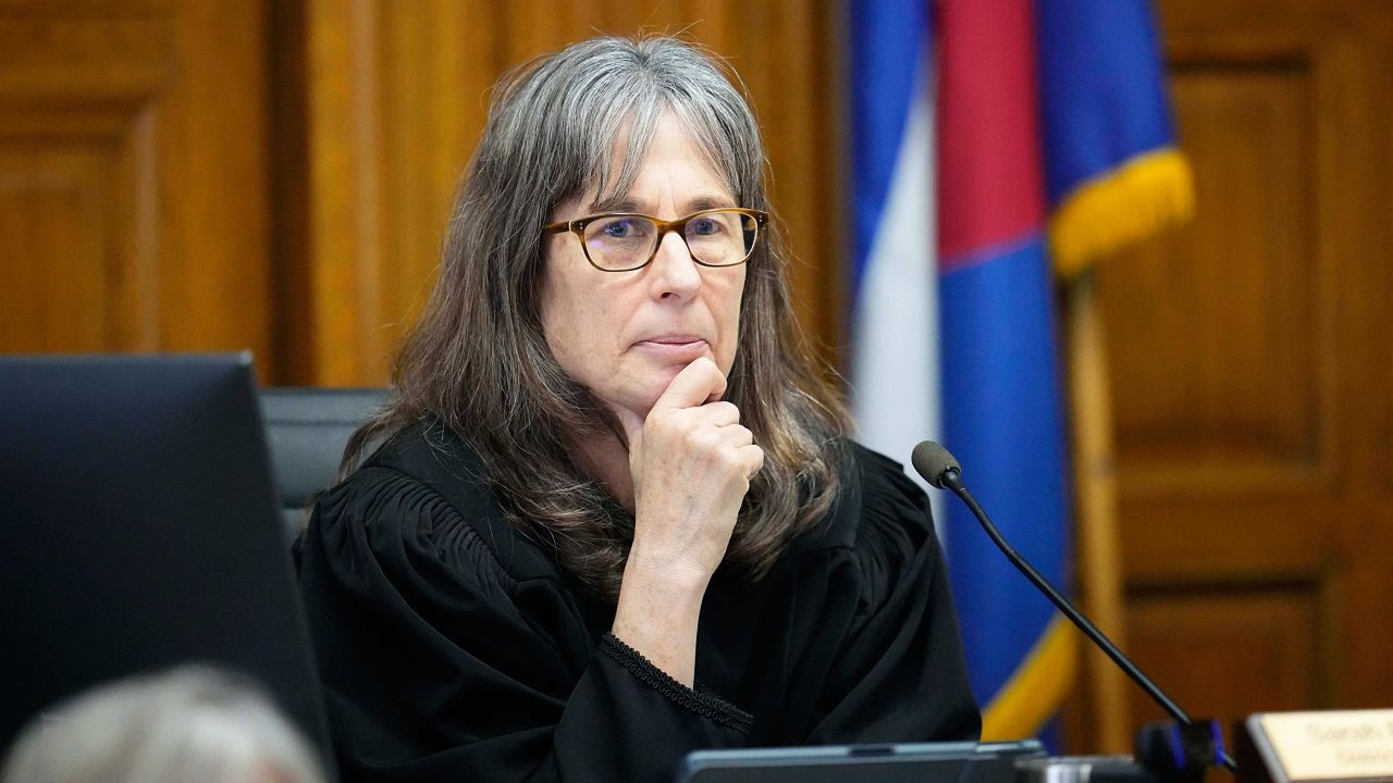 Judge Sarah B. Wallace presides over a hearing for a lawsuit to keep former President Donald Trump off the state ballot in court Wednesday, Nov. 1, 2023, in Denver. (AP Photo/Jack Dempsey, Pool)