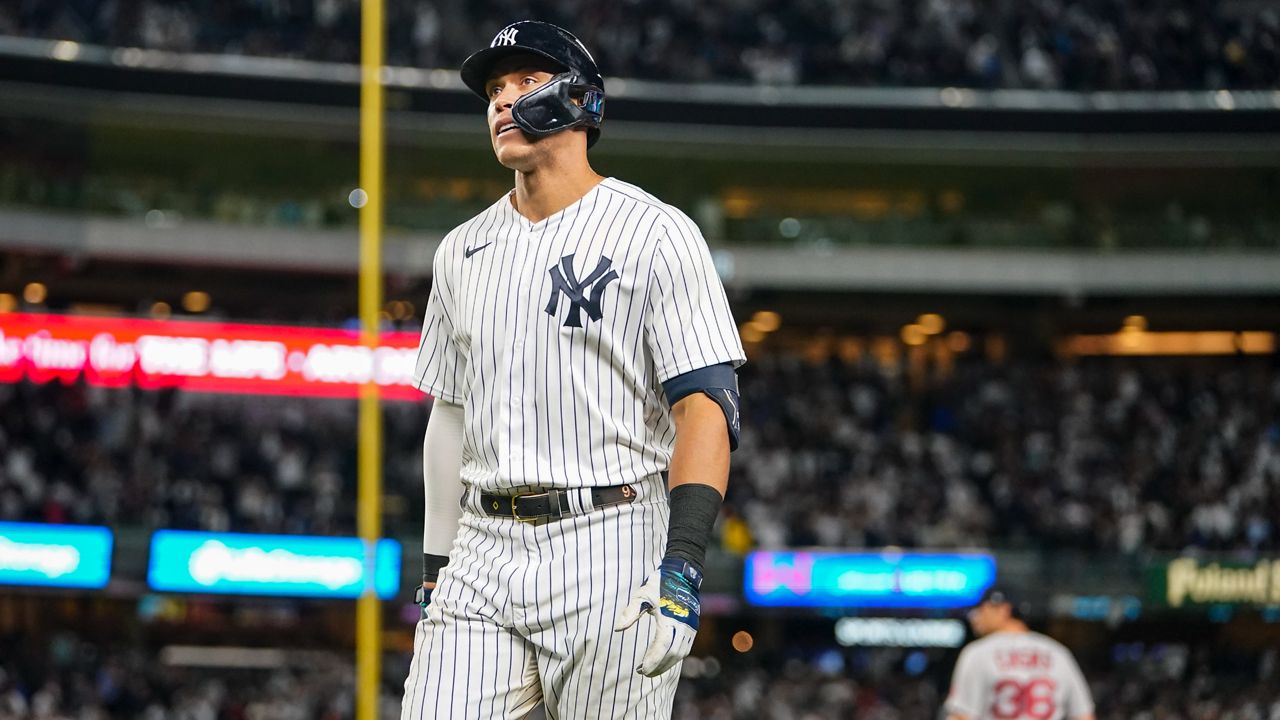 New York Yankees' Aaron Judge reacts after hitting a fly out during the ninth inning of a baseball game against the Boston Red Sox Thursday, Sept. 22, 2022, in New York. (AP Photo/Frank Franklin II)