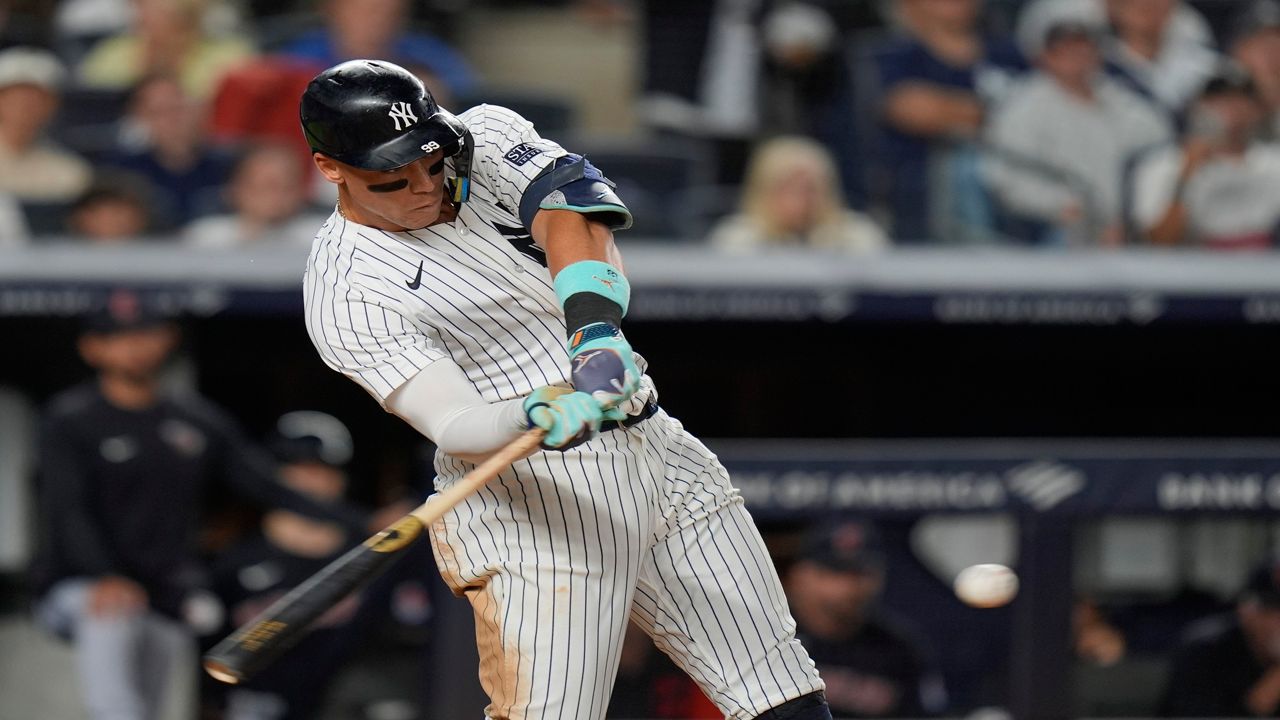 Cleveland Guardians' Lane Thomas looks after and RBI double during the 12th inning of a baseball game against the New York Yankees at Yankee Stadium Tuesday, Aug. 20, 2024, in New York. (AP Photo/Seth Wenig)