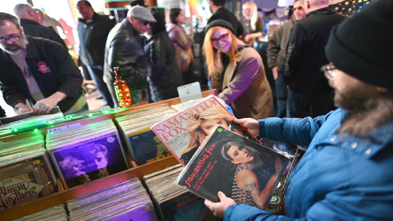 People look at records at Juju Bonz record store.