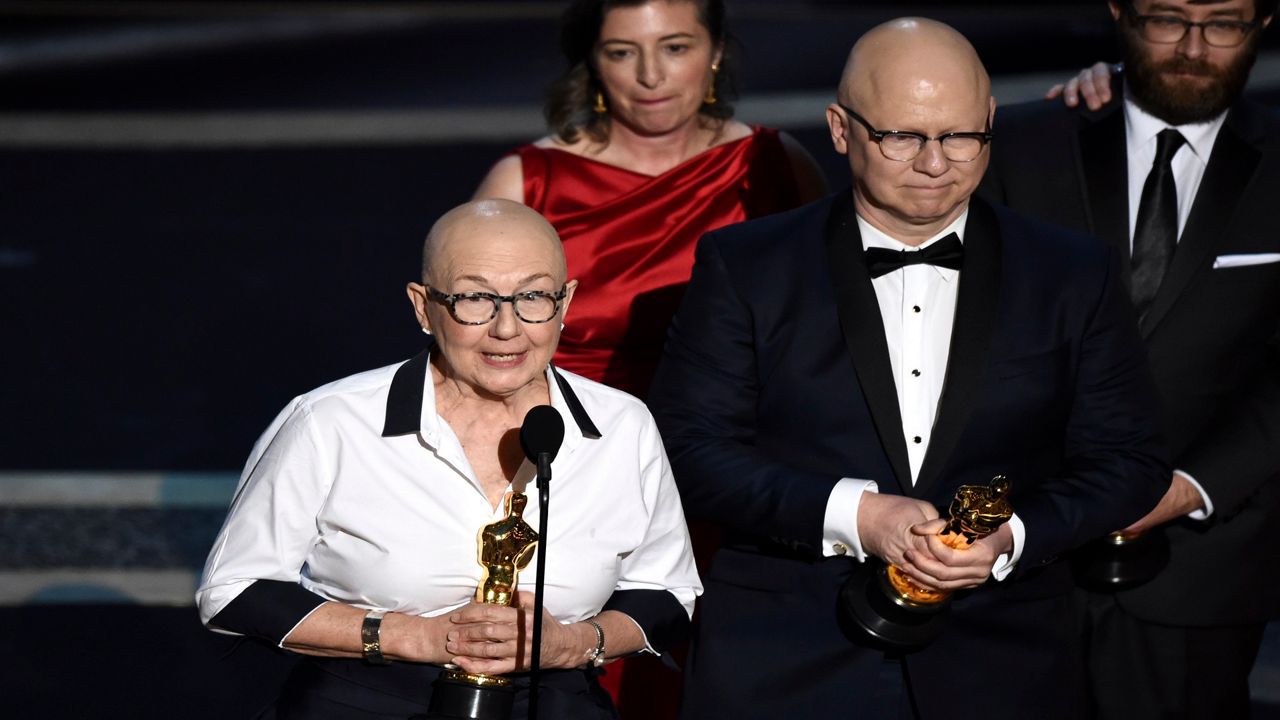 Julia Reichert, left, and Steven Bognar accept the award for best documentary feature for "American Factory" at the Oscars in Los Angeles on Feb. 9, 2020. Reichert, the Oscar-winning documentary filmmaker whose films explored themes of race, class and gender, often in the Midwest, died Thursday in Ohio from cancer, her family said Friday through a representative. She was 76. (AP Photo/Chris Pizzello, File)