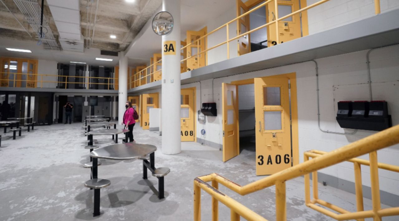 Reporters get a close up tour of the improvements made on the third floor at the St. Louis Justice Center in St. Louis on Wednesday, May 4, 2022. The improvements which include new cell locks and tables that are bolted to the floor were made following riots by inmates on February 6, 2021 and April 4, 2021 resulting in guards being injured, furniture tossed out windows and fires being started.   Photo by Bill Greenblatt/UPI