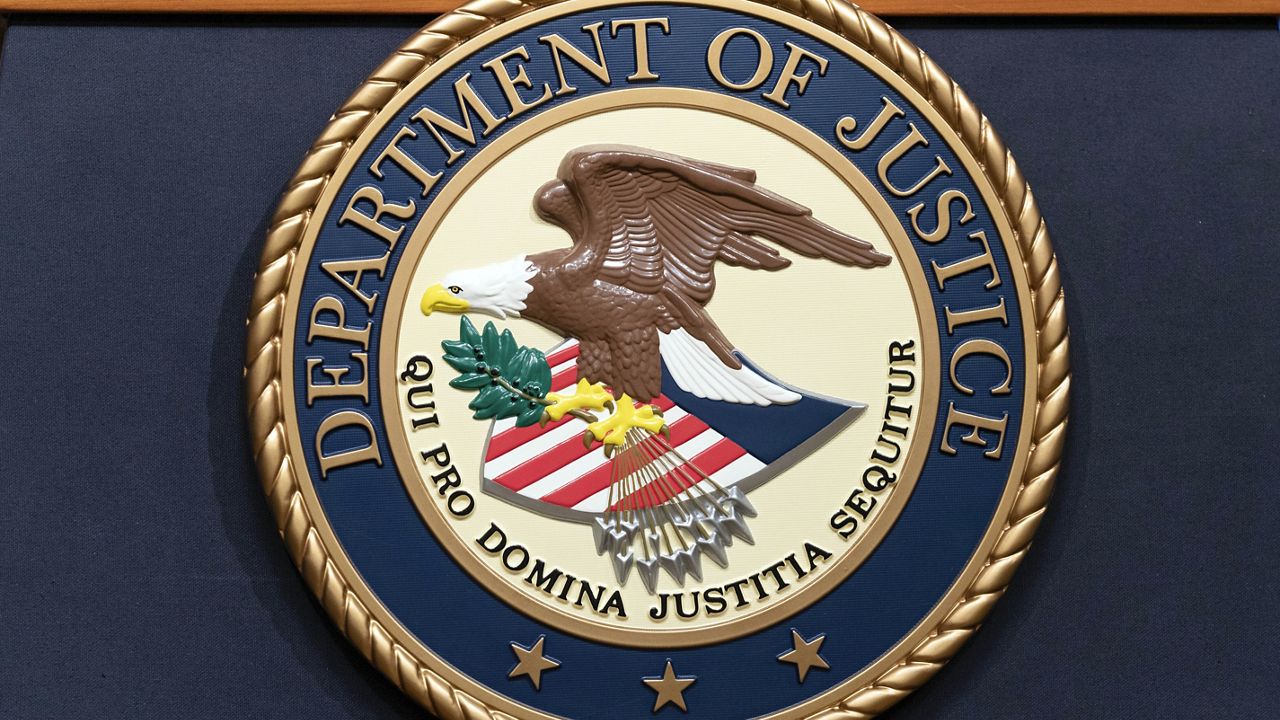 The Department of Justice seal (AP Photo/Jose Luis Magana, File)