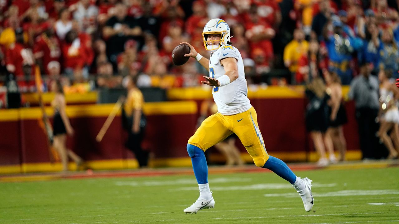 Los Angeles Chargers quarterback Justin Herbert throws during the first half of an NFL football game against the Kansas City Chiefs Thursday, Sept. 15, 2022, in Kansas City, Mo. (AP Photo/Charlie Riedel)