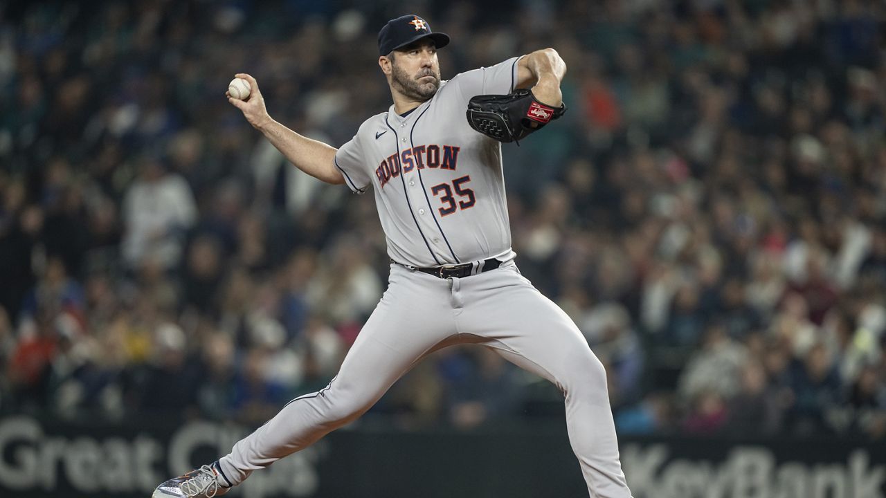 Houston Astros starter Justin Verlander delivers a pitch during the first inning of a baseball game against the Seattle Mariners, Monday, Sept. 25, 2023, in Seattle. (AP Photo/Stephen Brashear)