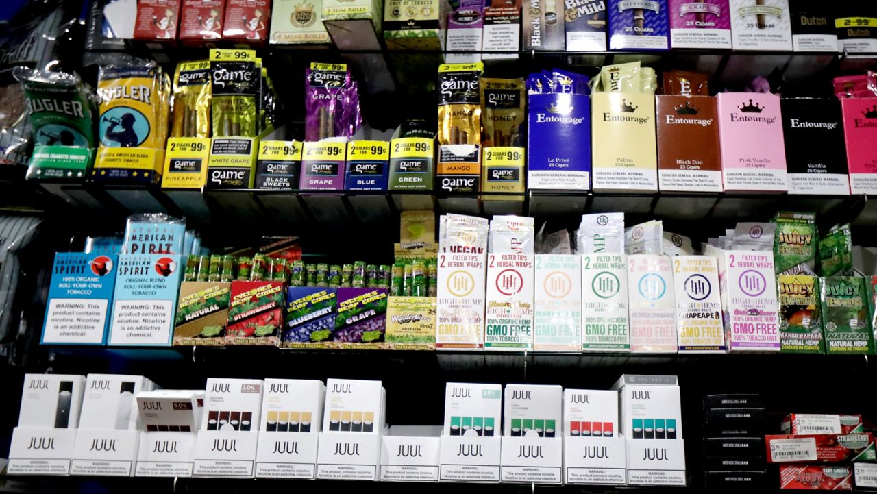 Juul electronic cigarettes are seen on display inside Urge, a smoke shop in Hoboken, on Thursday, Dec. 20, 2018.