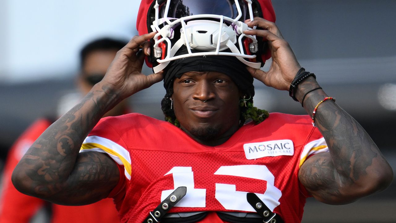 Kansas City Chiefs wide receiver Kadarius Toney walks to the field at the start of an NFL football training camp, July 27, 2024, in St. Joseph, Mo. (AP Photo/Reed Hoffmann, File)