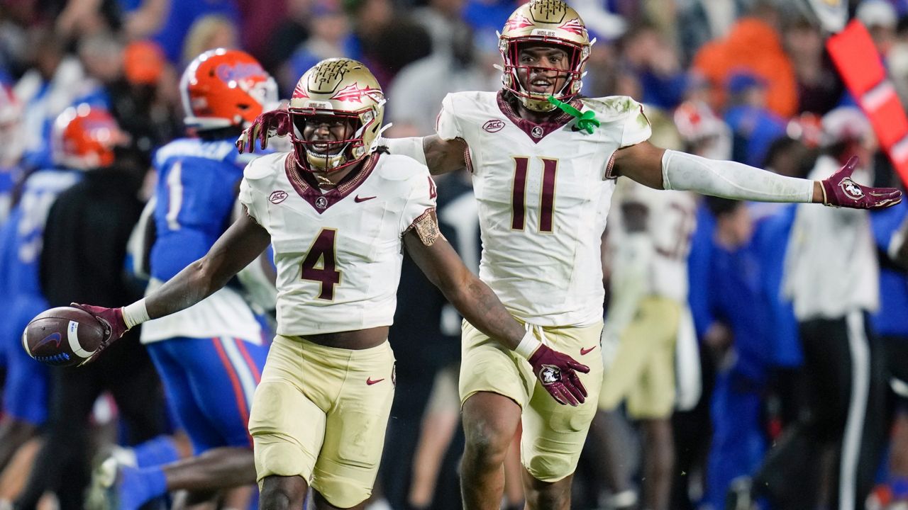 FSU's defense, including Jared Verse (11) and Kalen DeLoach (4), got stronger as the season progressed. (AP Photo/John Raoux)