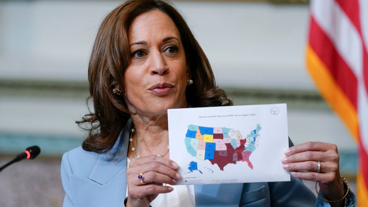 Vice President Kamala Harris displays a map showing abortion access by state as she speaks during the first meeting of the interagency Task Force on Reproductive Healthcare Access in the Indian Treaty Room in the Eisenhower Executive Office Building on the White House Campus in Washington, Aug. 3, 2022. Harris when speaking about abortion told voters in Illinois earlier this month that “extremist, so-called leaders trumpet the rhetoric of freedom while they take away freedoms.” (AP Photo/Susan Walsh, File)