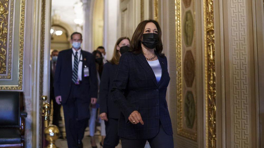 Vice President Kamala Harris arrives at the Capitol as the Senate convenes for a rare weekend session on the $1 trillion bipartisan infrastructure bill, at the Capitol in Washington, Saturday, Aug. 7, 2021. (AP Photo/J. Scott Applewhite)