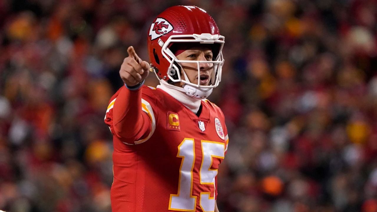 Kansas City Chiefs quarterback Patrick Mahomes signals teammates during the first half of the NFL AFC Championship playoff football game against the Cincinnati Bengals, Sunday, Jan. 29, 2023, in Kansas City, Mo. (AP Photo/Ed Zurga)