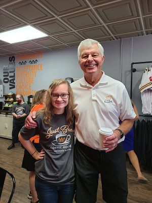 Kasey Johnson (L) with Ken Anderson at Just Brew Coffee House in Silverton, Ohio.