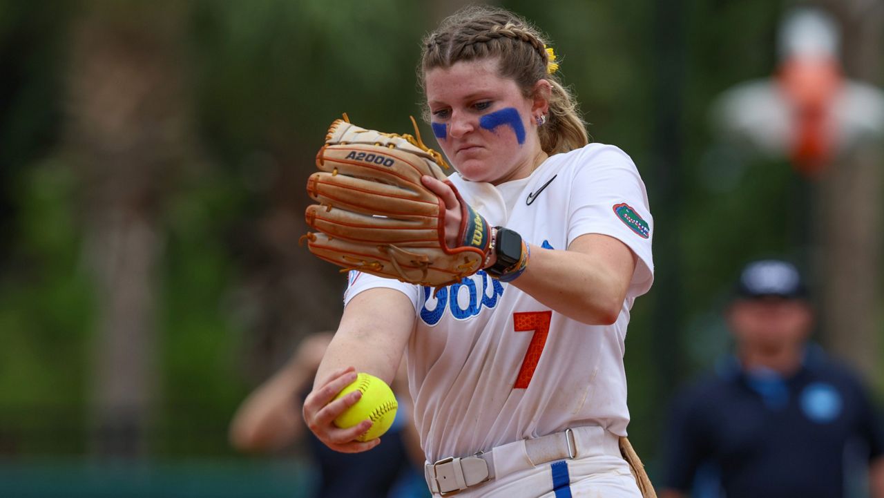 Florida's Keagan Rothrock, pictured in the regionals, pitched a complete game for her 30th win of the season. (AP Photo/Gary McCullough)