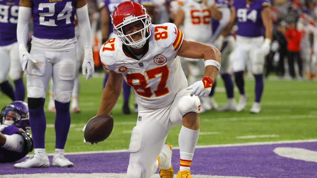 Kansas City Chiefs tight end Travis Kelce (87) celebrates after catching a 4-yard touchdown pass during the second half of an NFL football game against the Minnesota Vikings, Sunday, Oct. 8, 2023, in Minneapolis. (AP Photo/Bruce Kluckhohn)