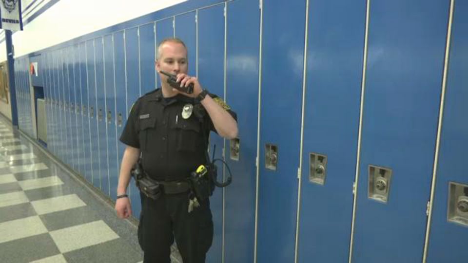 Image result for armed officer