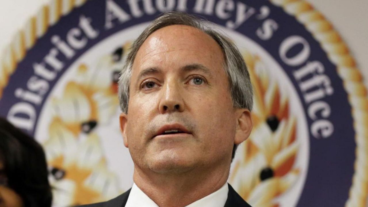 In this June 22, 2017 file photo, Texas Attorney General Ken Paxton speaks at a news conference in Dallas. As Paxton seeks to fend off legal troubles and win a third term as Texas' top law enforcement official, his agency has come unmoored by disarray behind the scenes, with seasoned lawyers quitting over practices they say aim to slant legal work, reward loyalists and drum out dissent. (AP Photo/Tony Gutierrez, File)