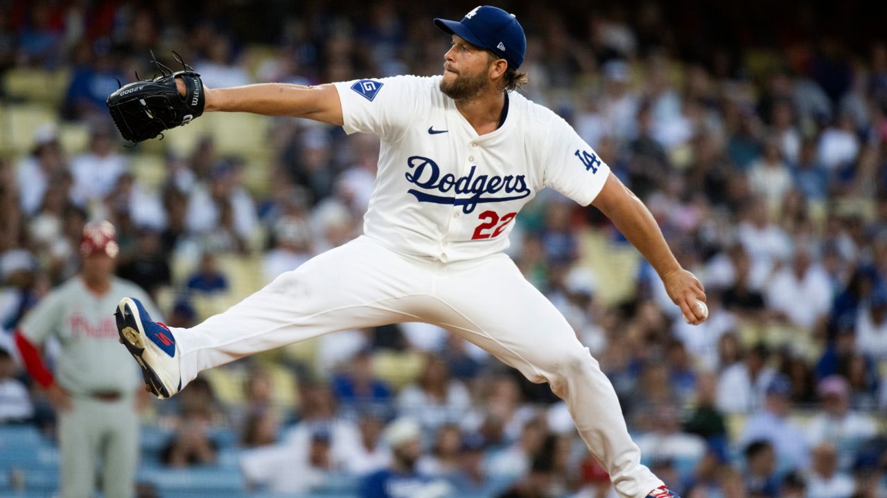 Los Angeles Dodgers starting pitcher Clayton Kershaw delivers a pitch during the first inning of a baseball game against the Philadelphia Phillies in LA on Tuesday. (AP Photo/Kyusung Gong)