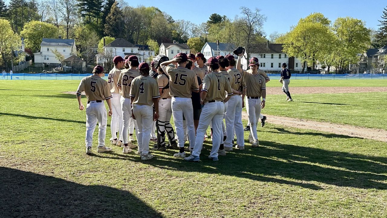 Doherty huddles up in between innings of their game vs Shrewsbury (Spectrum News1/Kevin Shea)