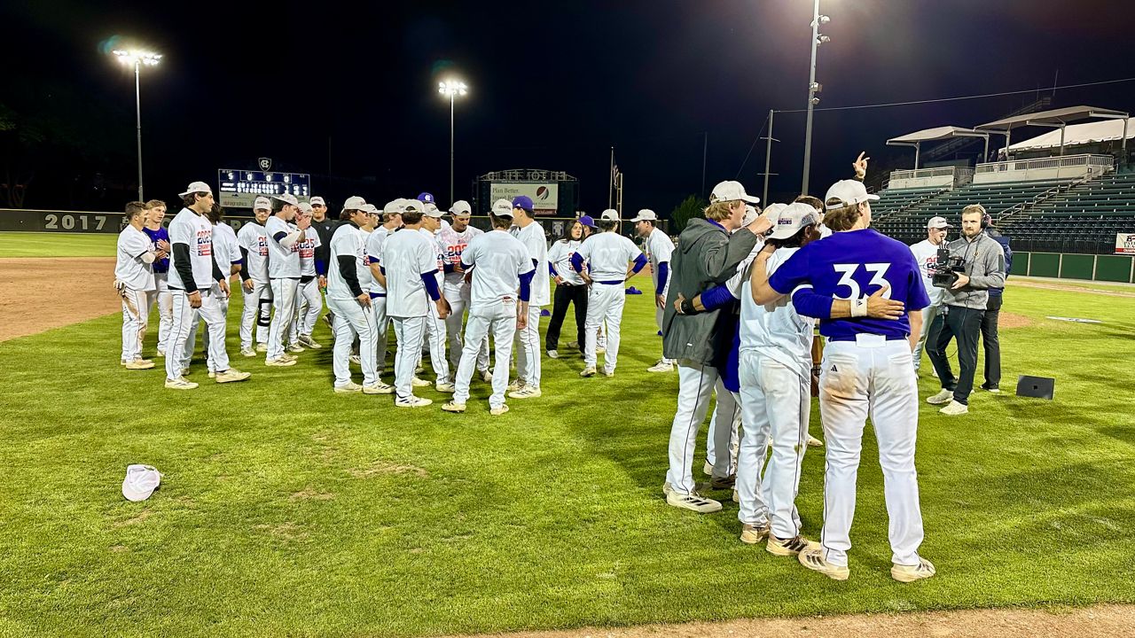 Holy Cross players celebrate their Patriot League Championship win (Spectrum News1/Kevin Shea)